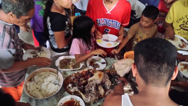 The Filipinos love lechon and a "free" meal